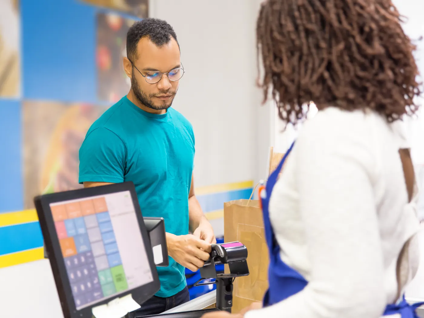 Customer paying at a retail store